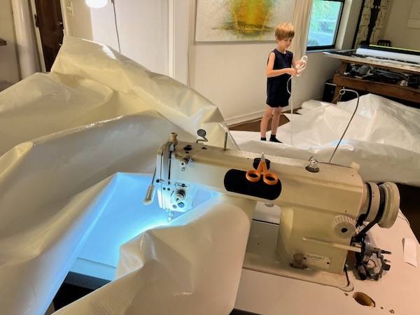otto elverston helps sew a rainshade by windfire designs