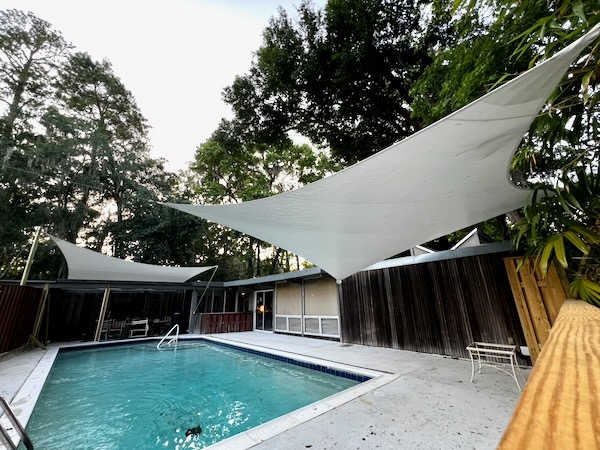 bill 1010 two swimming pool rainshades shade sail cloth by windfire designs