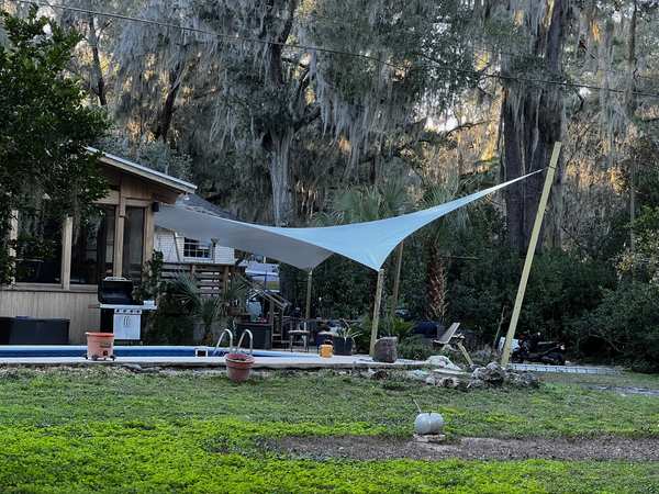 Image 12 from custom rainshades - tensile mambrane rain shelters for residential applications by windfire designs