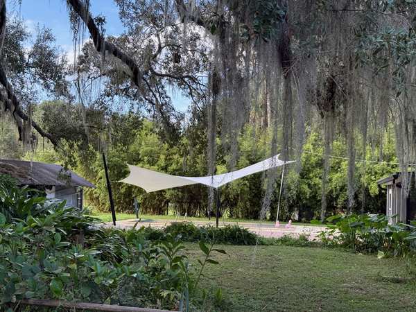 Image 38 from custom rainshades - tensile mambrane rain shelters for residential applications by windfire designs