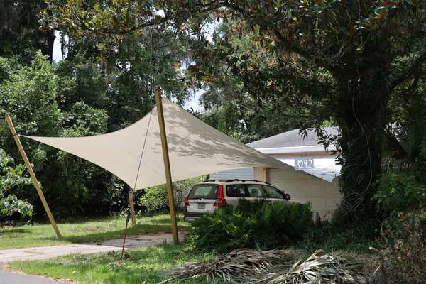 Image 53 from custom rainshades - tensile mambrane rain shelters for residential applications by windfire designs