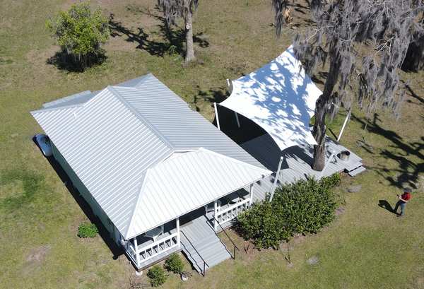 Image 69 from custom rainshades - tensile mambrane rain shelters for residential applications by windfire designs