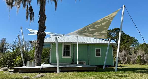Image 70 from custom rainshades - tensile mambrane rain shelters for residential applications by windfire designs