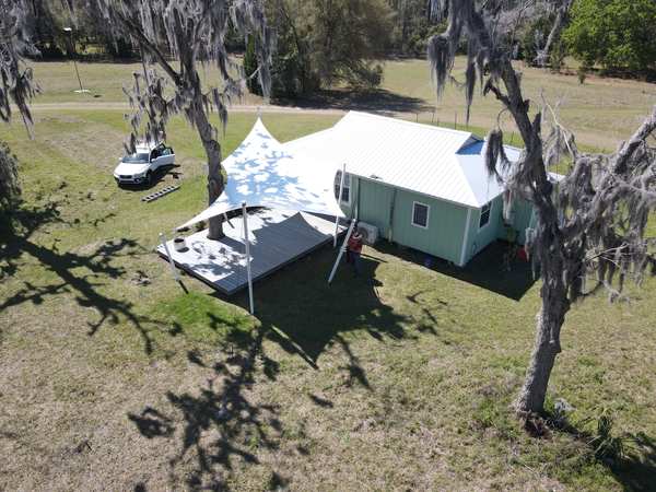 Image 84 from custom rainshades - tensile mambrane rain shelters for residential applications by windfire designs