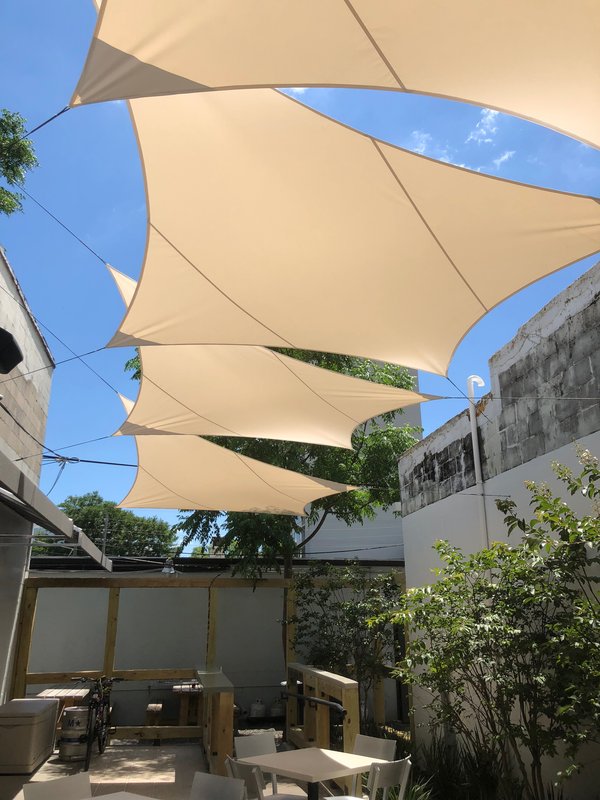 Image 25 custom shade sails - residential shade for porches, pools, decks, and patios for homes and restaurants - windfire designs