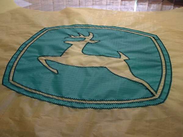 Image 7 from Branded indoor quadline kite for corporate trade show performance for John Deere - quadline kite by WindFire Designs