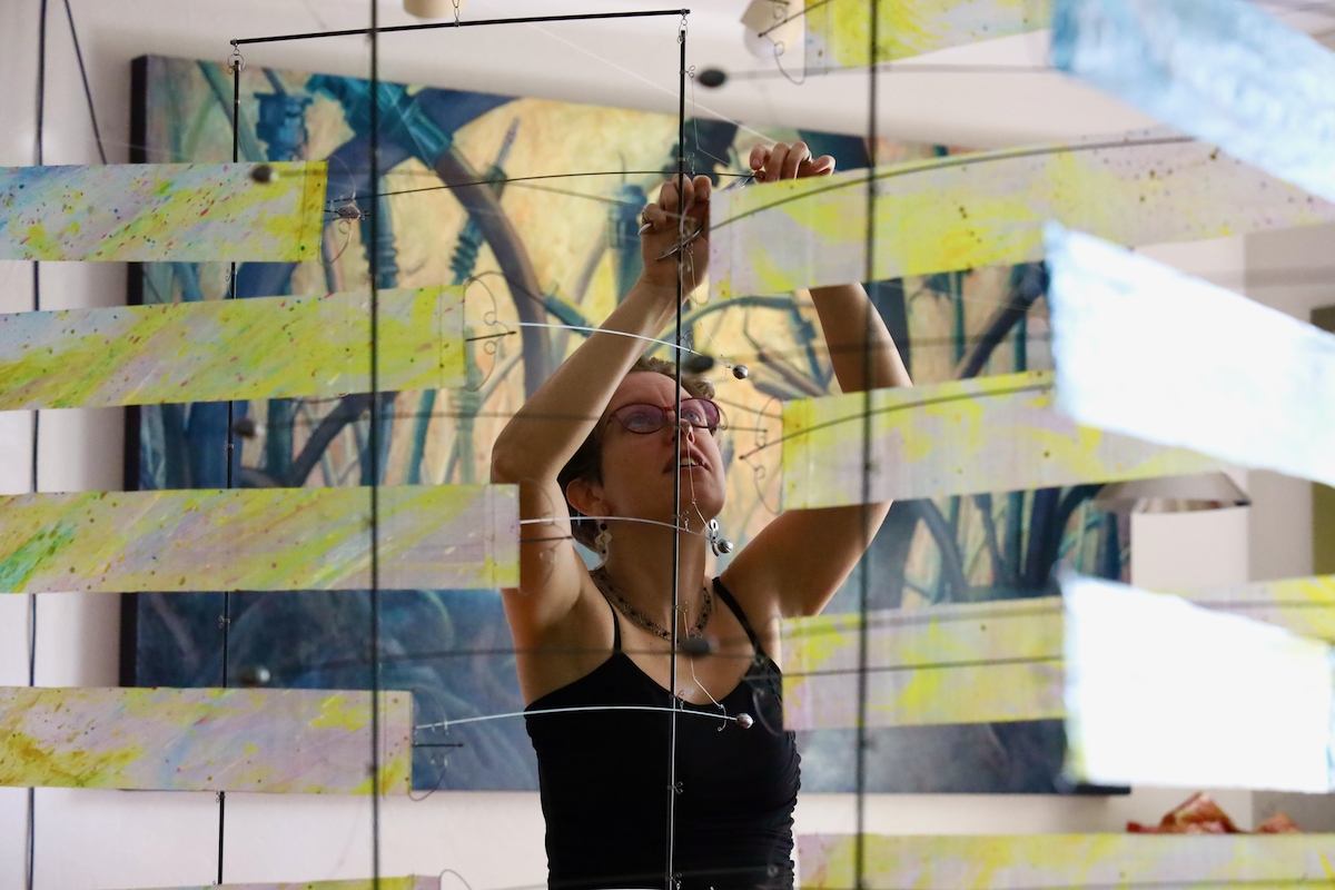 Ruth Whiting working on the AirColor Stacks kinetic art installation