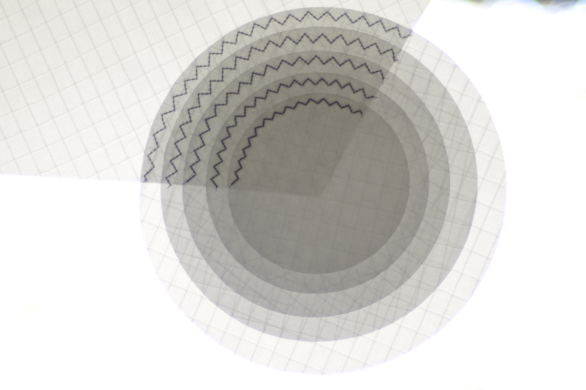 WindFire Designs Metal Circle Tool Template for hot and cold cutting circles from fabrics like dacron and other synthetics showing full range of sizes for fabric stepped down reinforcments of corners with circles
