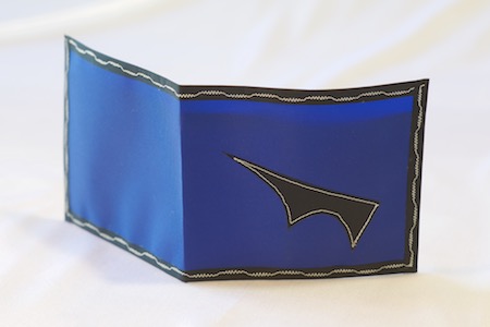 Pointy Spendy wallet blue with black trim standing