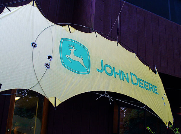 John Deere indoor kite for trade show event display performance - flame quadline kite by WindFire Designs