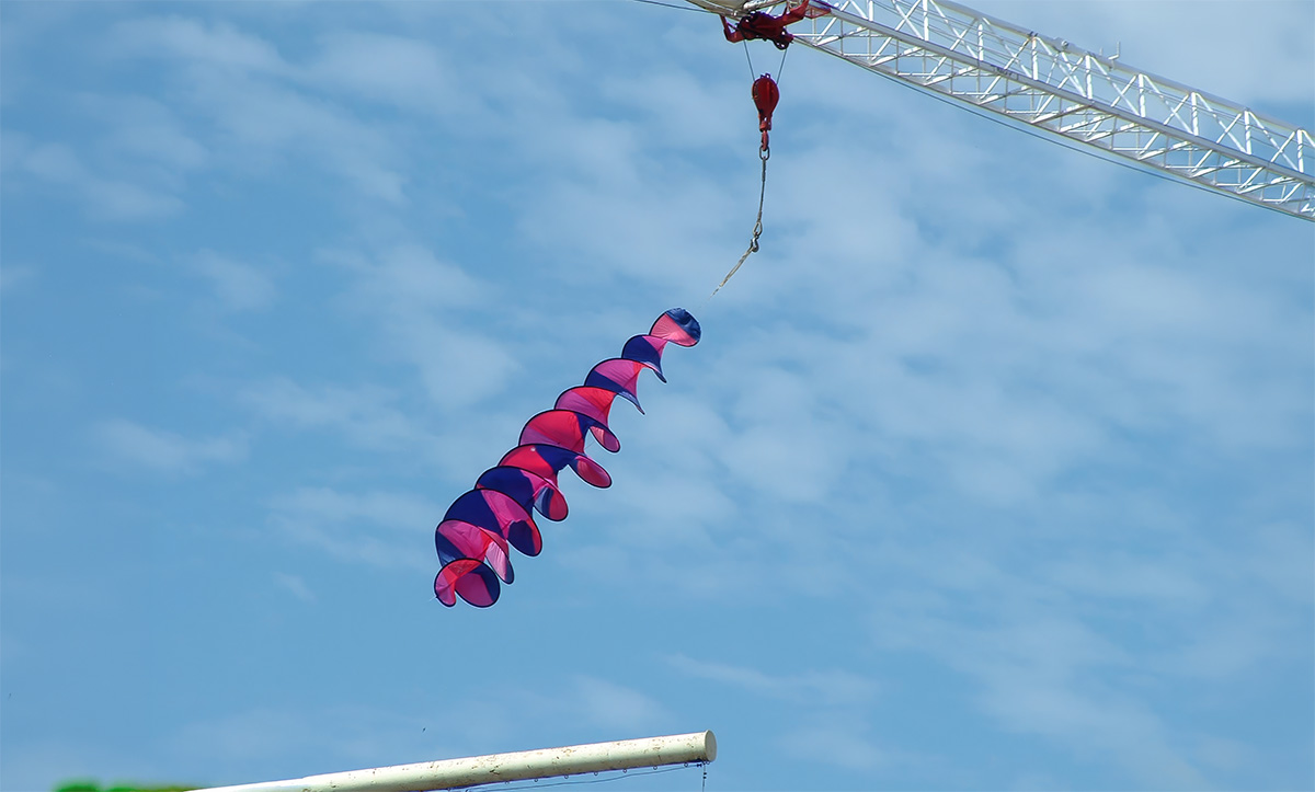 Madison Wisconsin giant spiral suspended by a crane - by WindFire Designs