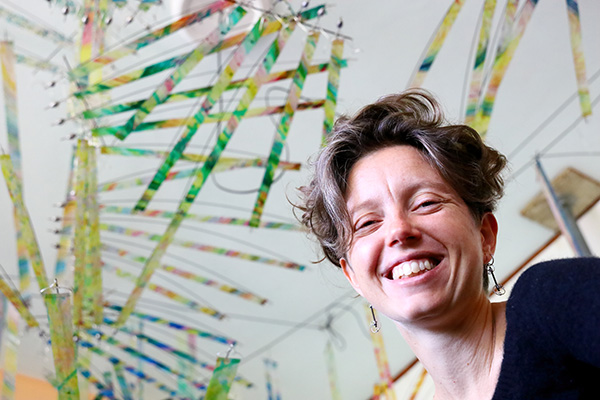 Ruth Whiting with the HandFlow kinetic installation in the sunroom