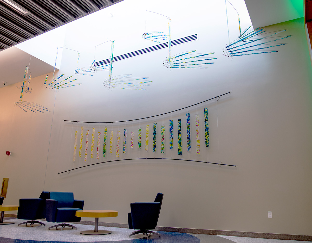 HandFlow completed installation with blues colorway and wall strips — WindFire Designs