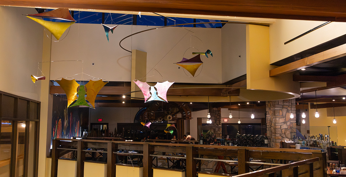 Minerals series kinetic installation at the Minerals Resort restaurant at night — WindFire Designs