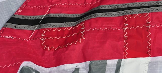F-One kite leading edge repair spanning roughly twelve feet